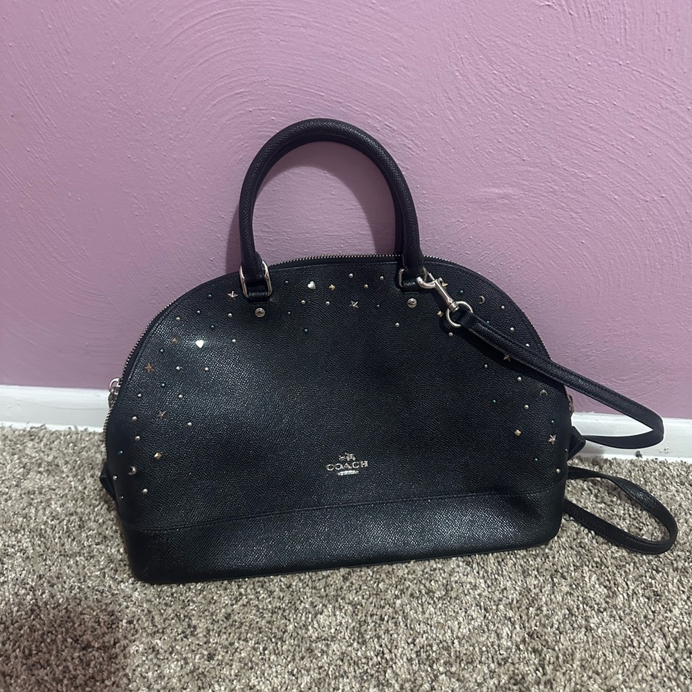 Coach purse with studs.